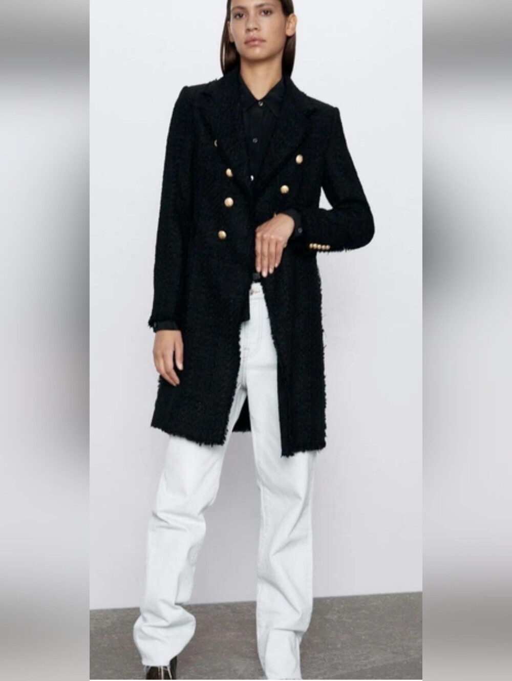 Zara black tweed double-breasted coat stands out with its striking gold military